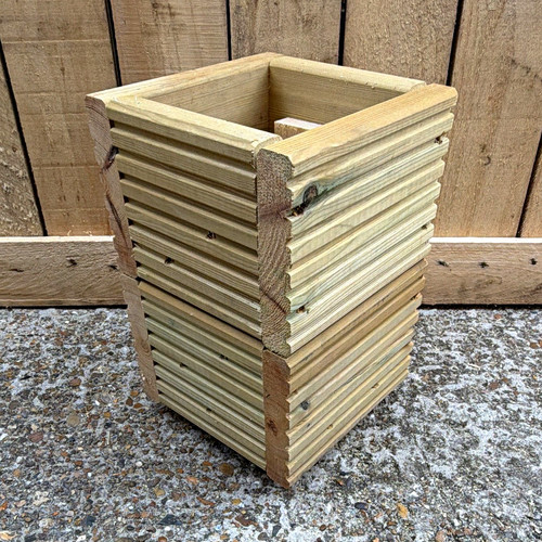 Treated wooden decking planter - treated,